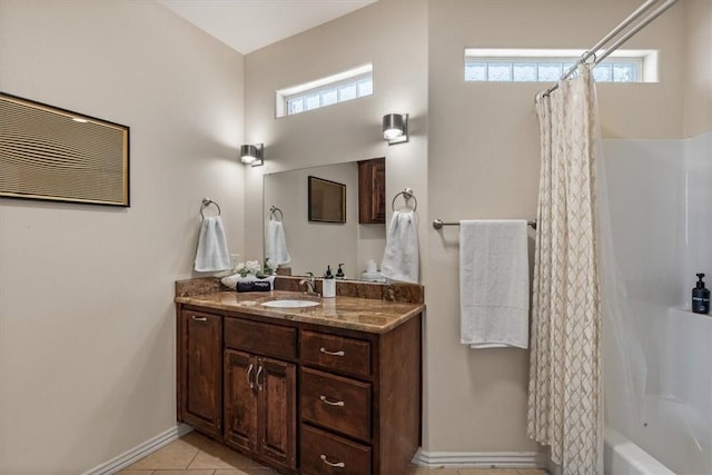 15100 Railroad Cut Rd, Rogers, AR 72756 - full bath featuring vanity, tile patterned flooring, and baseboards