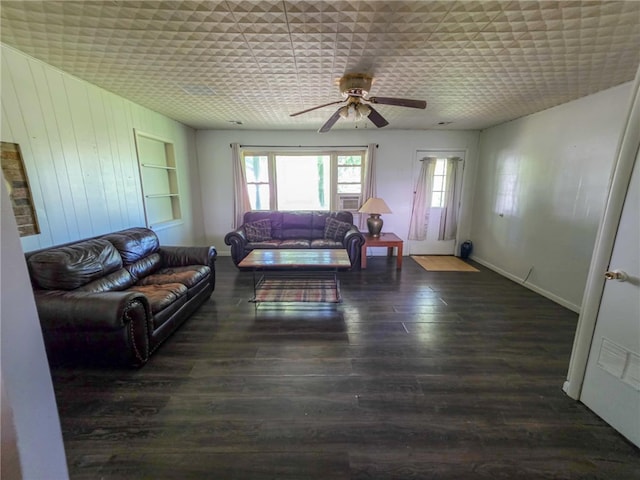 316 Napier Ave, Fayetteville, AR 72701 - living area with a ceiling fan, wood finished floors, baseboards, and wood walls
