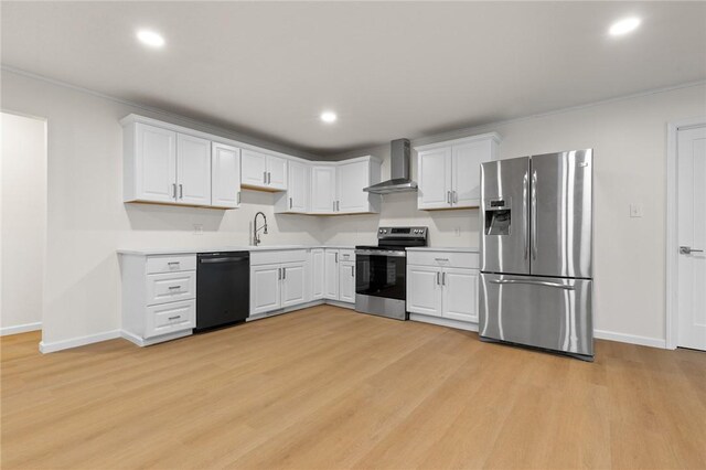 3916 O Street Ter, Harrison, AR 72601 - kitchen featuring stainless steel appliances, wall chimney exhaust hood, light wood-style flooring, baseboards, and recessed lighting