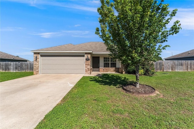 3381 Justice Dr, Springdale, AR 72764 - single story home featuring a garage, driveway, and brick siding