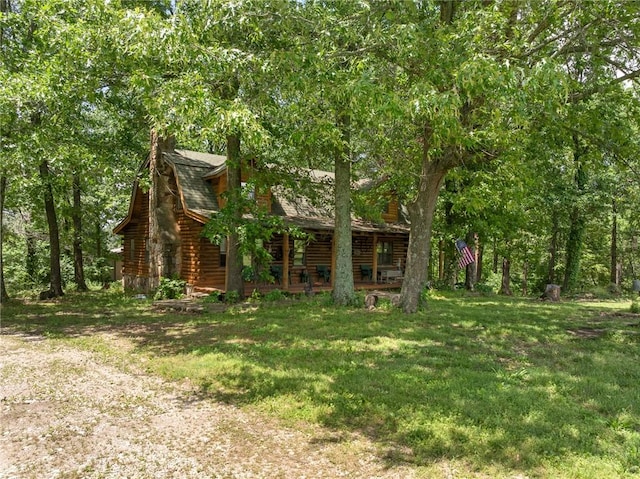 5287 Forgeson Rd, Harrison, AR 72601 - view of front of property with log exterior, a porch, a front lawn, and a chimney