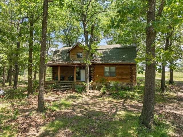 5287 Forgeson Rd, Harrison, AR 72601 - log cabin with a porch and log siding