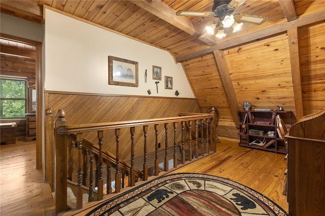 5287 Forgeson Rd, Harrison, AR 72601 - hall featuring an upstairs landing, wood walls, wood ceiling, wood-type flooring, and a wainscoted wall