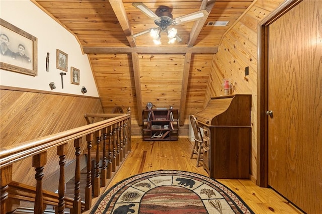 5287 Forgeson Rd, Harrison, AR 72601 - hallway featuring wooden ceiling, wooden walls, an upstairs landing, and light wood finished floors