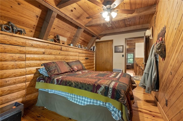 5287 Forgeson Rd, Harrison, AR 72601 - bedroom featuring wood ceiling, light wood finished floors, and rustic walls