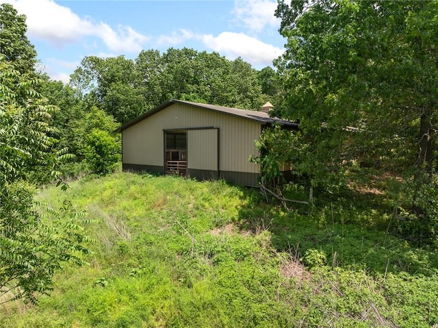 5287 Forgeson Rd, Harrison, AR 72601 - view of property exterior featuring a pole building and an outbuilding