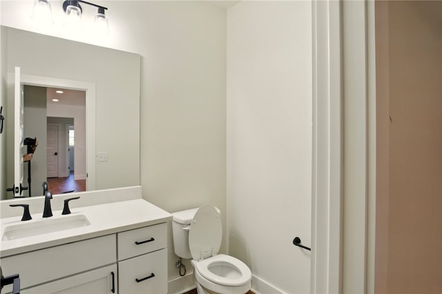 4551 Gibson St, Springdale, AR 72762 - half bath featuring toilet, vanity, and baseboards