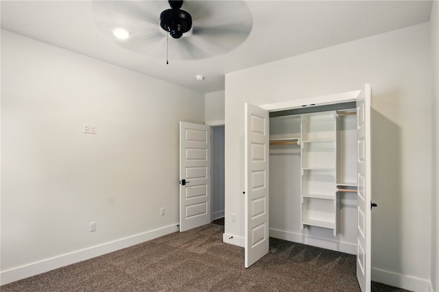 4551 Gibson St, Springdale, AR 72762 - unfurnished bedroom with dark colored carpet, baseboards, a closet, and ceiling fan