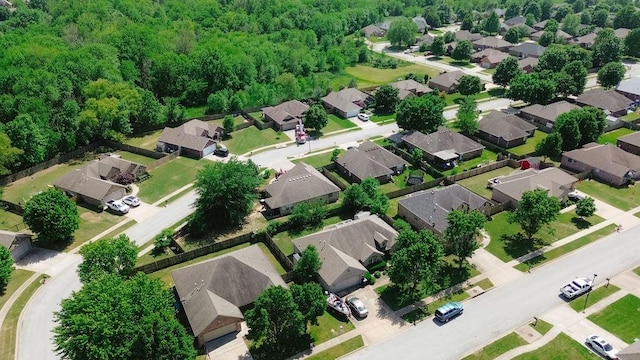 4007 W Song Bird Pl, Fayetteville, AR 72704 - aerial perspective of suburban area featuring a heavily wooded area