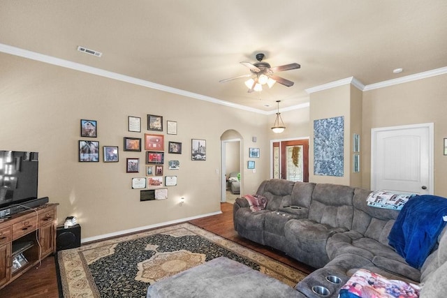 4007 W Song Bird Pl, Fayetteville, AR 72704 - living room with arched walkways, dark wood-style floors, a ceiling fan, ornamental molding, and baseboards