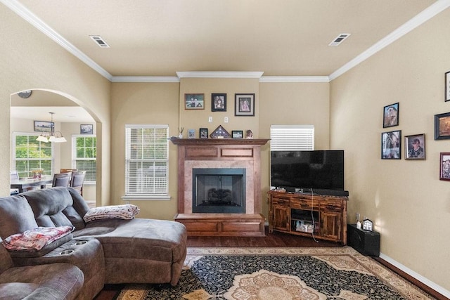 4007 W Song Bird Pl, Fayetteville, AR 72704 - living area with wood finished floors, crown molding, a premium fireplace, a chandelier, and baseboards