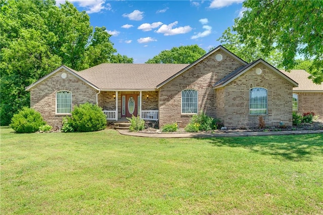 1480 Dallas St, Gravette, AR 72736 - ranch-style home featuring brick siding, covered porch, and a front yard