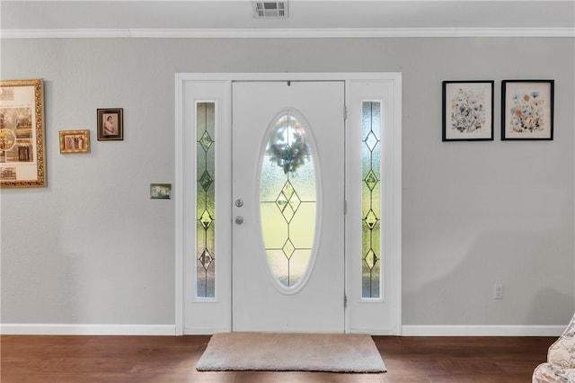 1480 Dallas St, Gravette, AR 72736 - foyer entrance with wood finished floors, ornamental molding, and baseboards
