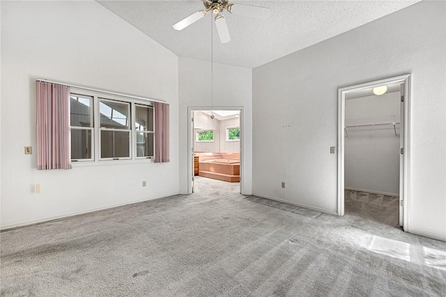 22 Marina Cir, Bella Vista, AR 72715 - carpeted spare room featuring a textured ceiling, a ceiling fan, and high vaulted ceiling