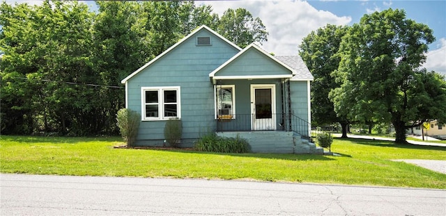 1000 Wilson Ave, Harrison, AR 72601 - bungalow with a porch and a front lawn