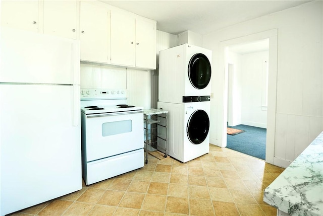 1000 Wilson Ave, Harrison, AR 72601 - kitchen featuring white appliances, stacked washer and clothes dryer, light countertops, and white cabinets