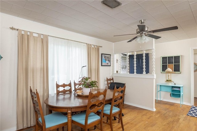 1600 Westwood Ave, Springdale, AR 72762 - dining space with wood finished floors, ceiling fan, and baseboards
