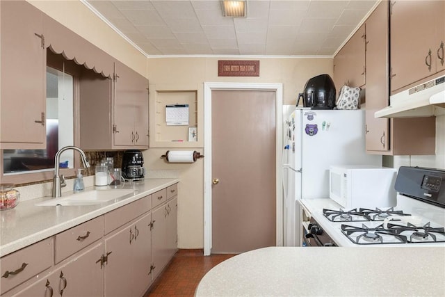 1600 Westwood Ave, Springdale, AR 72762 - kitchen featuring a sink, under cabinet range hood, ornamental molding, white appliances, and light countertops