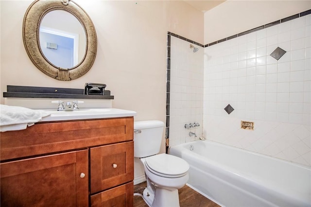 1125 E Elm St, Fayetteville, AR 72703 - bathroom with toilet, vanity, and bathtub / shower combination