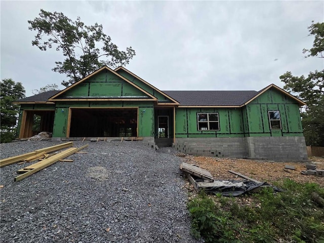 11 Fountainhall Cir, Bella Vista, AR 72715 - unfinished property featuring an attached garage and driveway