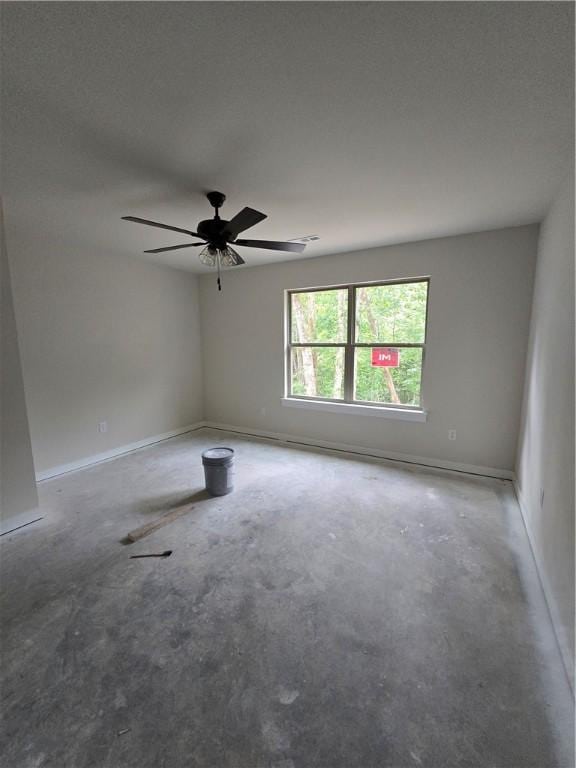 3 Drem Cir, Bella Vista, AR 72715 - unfurnished room with a ceiling fan and baseboards