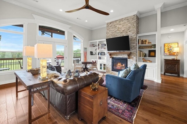 1699 E Bowen Blvd, Fayetteville, AR 72703 - living room with a ceiling fan, hardwood / wood-style floors, a stone fireplace, ornamental molding, and recessed lighting