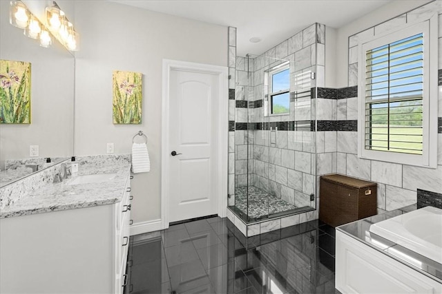 1699 E Bowen Blvd, Fayetteville, AR 72703 - bathroom with vanity, a shower stall, baseboards, and tile walls