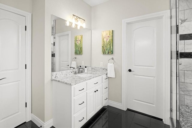 1699 E Bowen Blvd, Fayetteville, AR 72703 - full bath featuring baseboards, vanity, a shower stall, and a chandelier