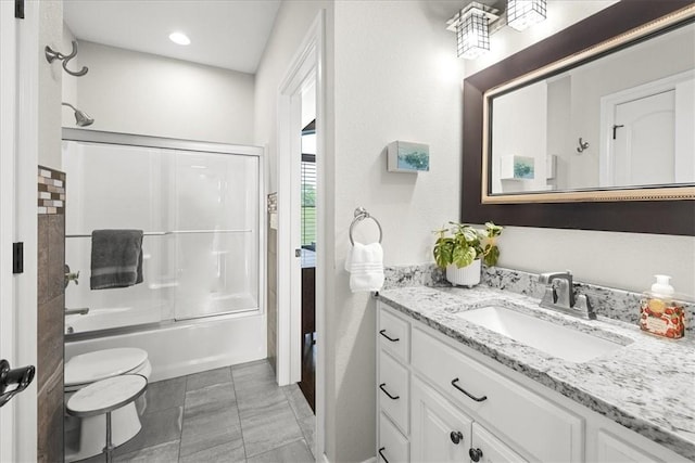 1699 E Bowen Blvd, Fayetteville, AR 72703 - bathroom with toilet, vanity, bath / shower combo with glass door, and recessed lighting