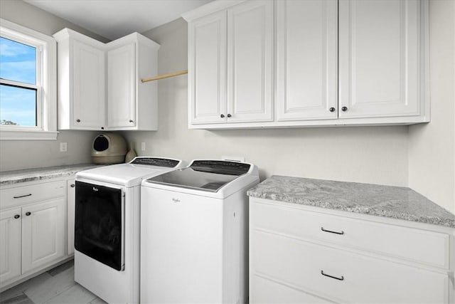 1699 E Bowen Blvd, Fayetteville, AR 72703 - washroom featuring cabinet space and washer and clothes dryer
