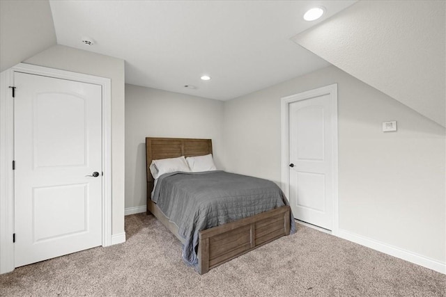 1699 E Bowen Blvd, Fayetteville, AR 72703 - bedroom with carpet floors, recessed lighting, baseboards, and lofted ceiling