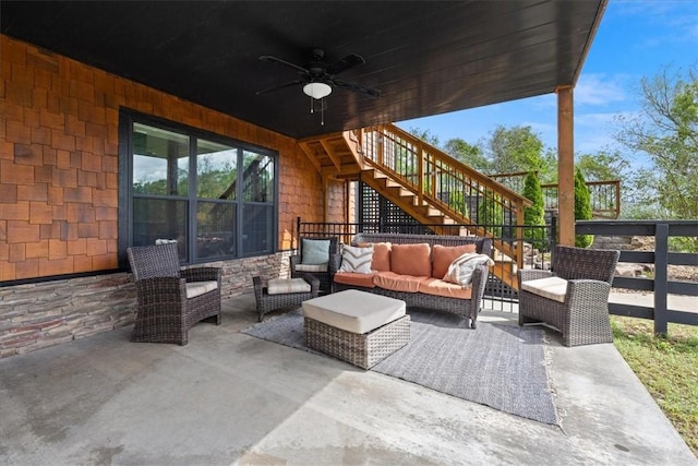 1699 E Bowen Blvd, Fayetteville, AR 72703 - view of patio featuring stairs, ceiling fan, and an outdoor hangout area