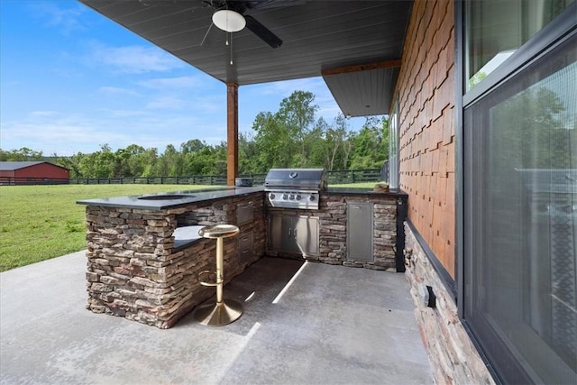 1699 E Bowen Blvd, Fayetteville, AR 72703 - view of patio with a ceiling fan and view of scattered trees