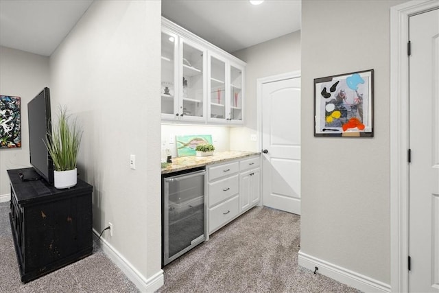 1699 E Bowen Blvd, Fayetteville, AR 72703 - indoor bar featuring wine cooler, light carpet, and baseboards