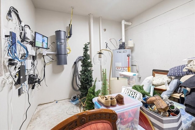 1699 E Bowen Blvd, Fayetteville, AR 72703 - utility room with water heater and a central vacuum unit