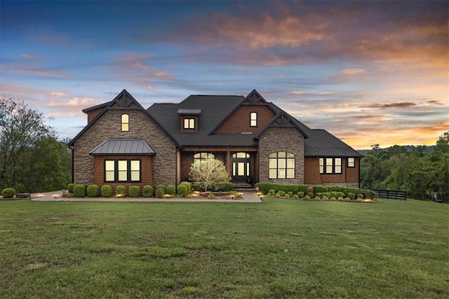 1699 E Bowen Blvd, Fayetteville, AR 72703 - view of front of house featuring stone siding and a front yard