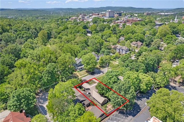 324 E Sutton St, Fayetteville, AR 72701 - aerial view of property's location with property parcel outlined and a forest