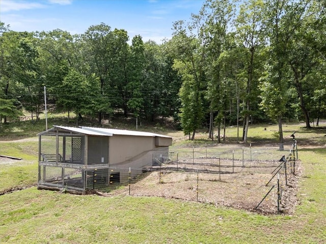 3139 Madison Unit 2405, Huntsville, AR 72740 - view of yard with exterior structure and an outdoor structure