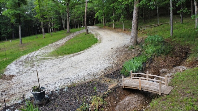 3139 Madison Unit 2405, Huntsville, AR 72740 - view of dirt / gravel road featuring a view of trees
