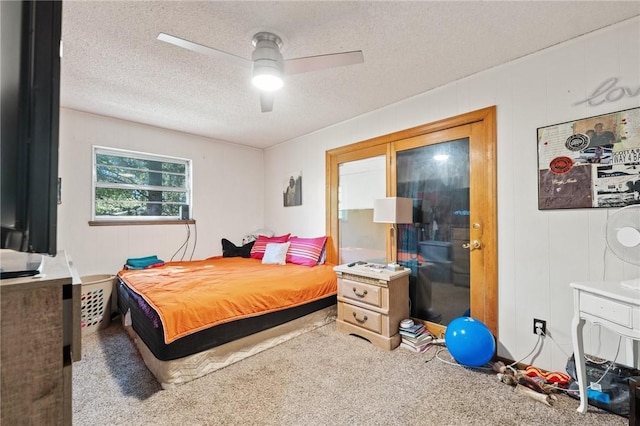 7 Ipswich Dr, Bella Vista, AR 72714 - bedroom featuring carpet, a textured ceiling, and a ceiling fan