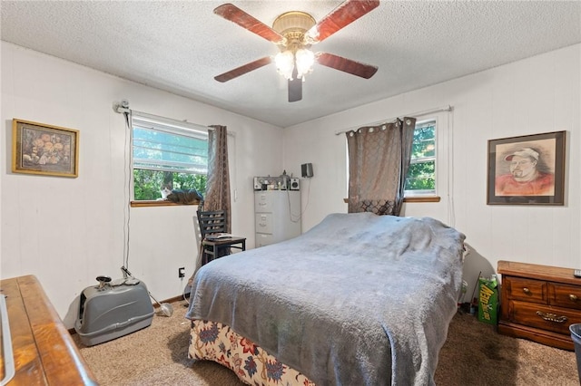 7 Ipswich Dr, Bella Vista, AR 72714 - carpeted bedroom featuring a textured ceiling and ceiling fan