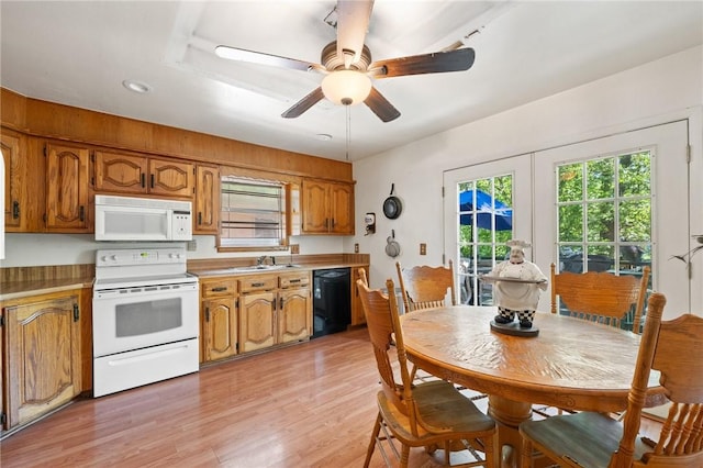 7 Ipswich Dr, Bella Vista, AR 72714 - kitchen with white appliances, brown cabinetry, light wood-style floors, a sink, and recessed lighting