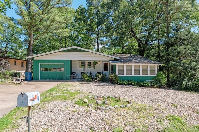 7 Ipswich Dr, Bella Vista, AR 72714 - view of front of property with driveway and a garage