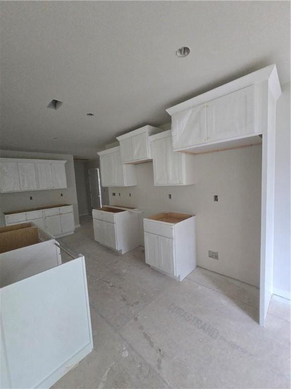 7 Julletta Cir, Bella Vista, AR 72715 - kitchen featuring white cabinets