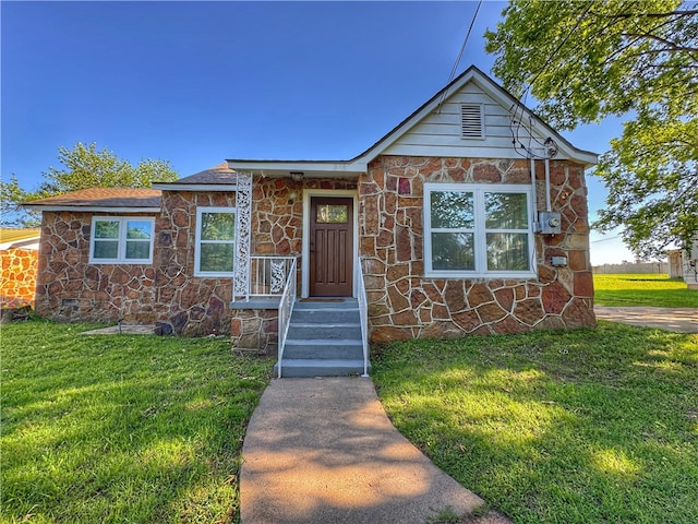 1105 Gibson St, Ozark, AR 72949 - view of front of home featuring a front lawn and stone siding