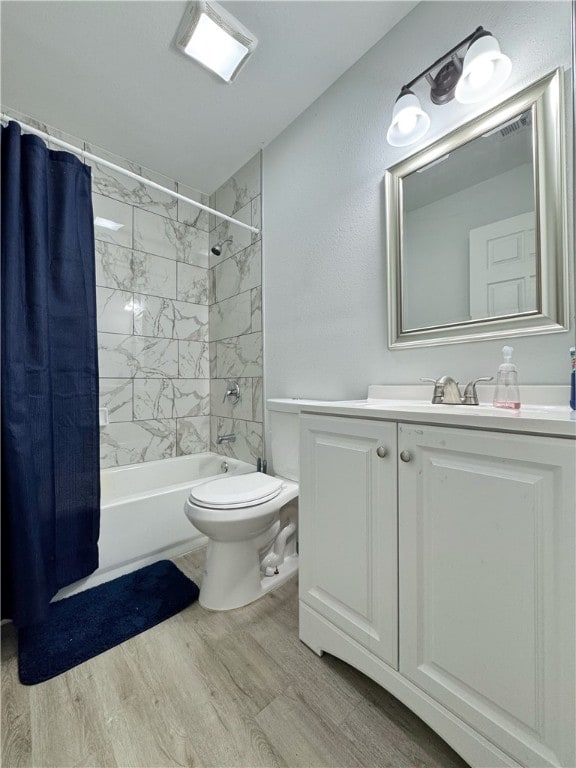 1105 Gibson St, Ozark, AR 72949 - full bathroom with toilet, shower / bathtub combination with curtain, wood finished floors, and vanity