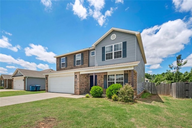904 SW Loudon Dr, Bentonville, AR 72712 - view of front of house with driveway, brick siding, and a garage