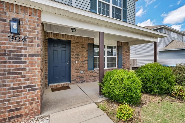904 SW Loudon Dr, Bentonville, AR 72712 - property entrance featuring brick siding and covered porch