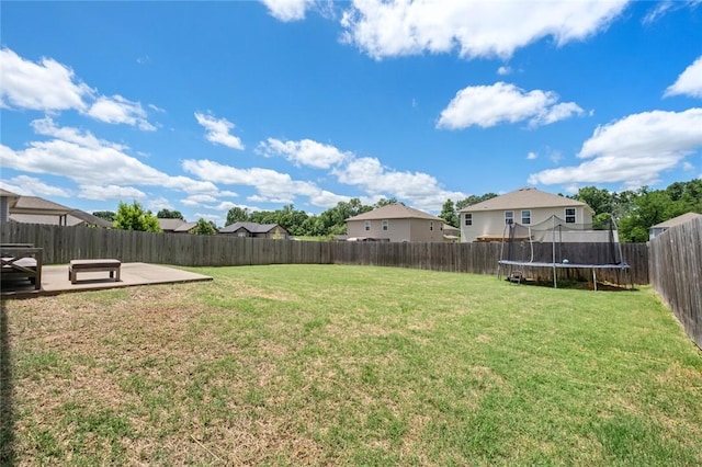 904 SW Loudon Dr, Bentonville, AR 72712 - view of yard featuring a trampoline and a patio