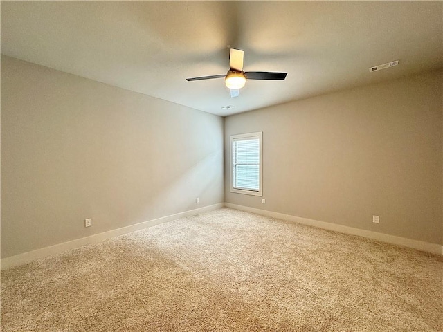 903 NE Heights Ln, Bentonville, AR 72712 - carpeted empty room with a ceiling fan and baseboards